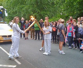 Sasha Carter Lighting Up Olympic Flame at Hers 19th Birthday