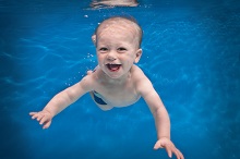 Baby Swimming Classes by Aqua Babies in the Manchester City Center and Hale