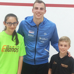 Myles Maguire with Nick Matthew after squash exhibition match