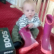 Baby unpacking BOGS wellies boots
