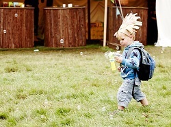 Child running and making bubbles | Run Wild, Child event, Manchester