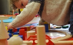 playing with wooden toys at Mini Sparks