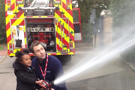 Firefighter and AESG pupil