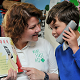 King's Junior and Infant Division pupil learns emergency phone numbers with the help from Mini First Aid representative