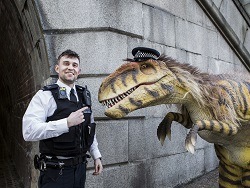 dinosaur and a policeman