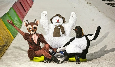 Snowman, reindeer and penguin from The Snowman show on the slope of Chill Factore