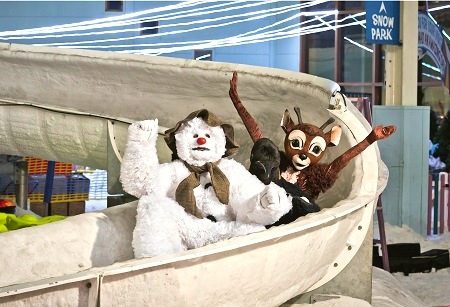 Snowman, reindeer and penguin from The Snowman show on the Luge Slip 'n' Slide at Chill Factore