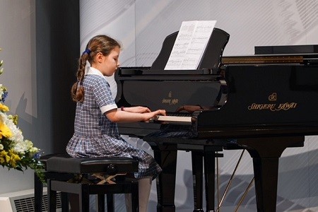 Harriet Bright is playing piano at the Alderley Edge Musical Festival finale
