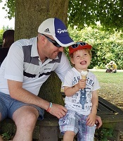 A boy enjoying his ice cream at the fan fair