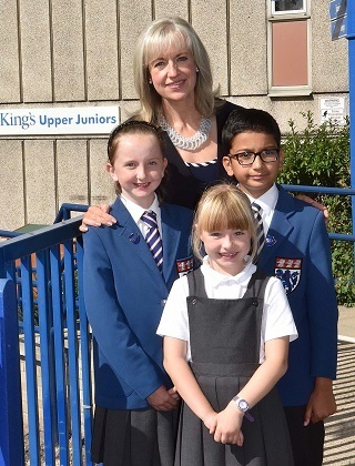 Rachel Cookson, new Principal of the King's School Infant and Junior Division with kids.