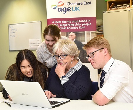 King's school pupils teaching computing skills to the elderly
