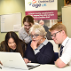 King's school pupils give computing lessons to the older people.