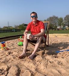 Sunbathing at sandpit