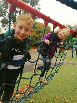 Kids at the spider climbing frame | Aleksandra Park's playground