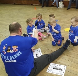 Kids getting certificates after the class at Little Beanz