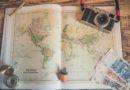 Travel accessories: world map compass, money, Photo by Chris-Lawton, Unsplash