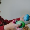 Boy playing with colour mold