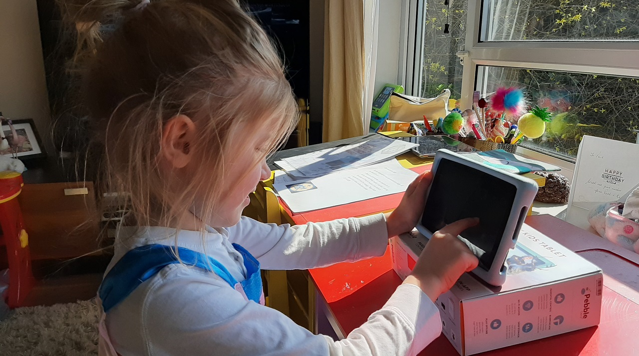 Girl playing with 7inch kids tablet