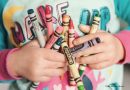 Child with Crayola felt pens