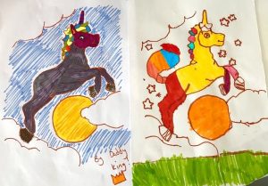 Two unicorns, tracing competition with Dad