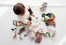 A baby playing with toys | Photo by shirota yuri