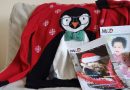 Christmas sweater and magazines