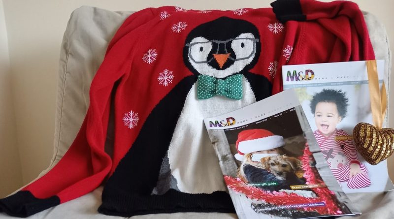 Christmas sweater and magazines