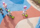 Kids riding Yvolution Glider Scooters