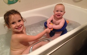 Kids are playing with bath toys
