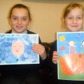 Alexandria McLelland and Liberty MacLeod with their winning paintings