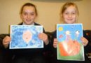 Alexandria McLelland and Liberty MacLeod with their winning paintings