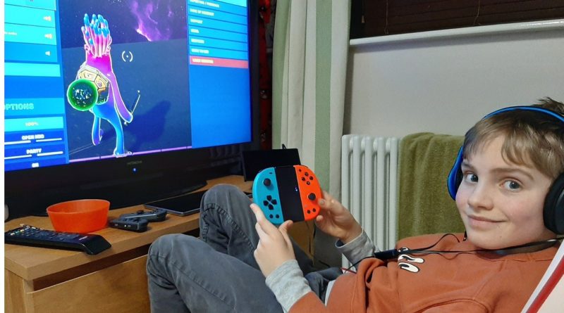 Boy playing with Minecraft Controller for Nintendo Switch