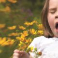 Hay fever - sneezing girl