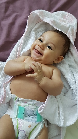 Baby smiles by Walaa Khaleel from unsplash