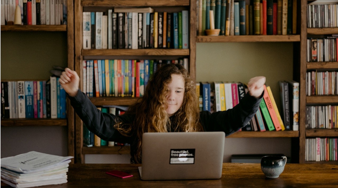 Girl working on computer | photo by Annie Spratt, unsplash