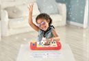 Child playing DJ on Hape's DJ Mix & Spin Studio