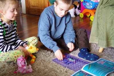 Children assembling Hot Wire electronic set