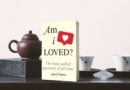 book Am I Loved on a tea table