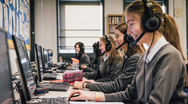 Girls from Manchester High using technology