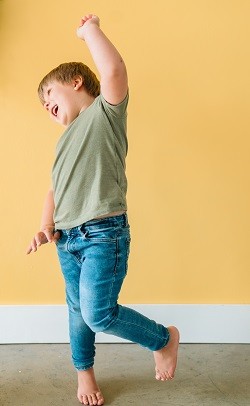 Boy dancing by alyssa-henson from unsplash