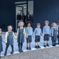 Children of Greenbank Prep waiting for their new classroom
