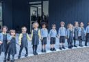 Children of Greenbank Prep waiting for their new classroom