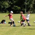 Kids playing football at Didsbury Football Club | Photo by Theo Latham