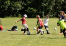 Kids playing football at Didsbury Football Club | Photo by Theo Latham