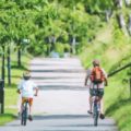 Family on bikes by yiwen from unsplash