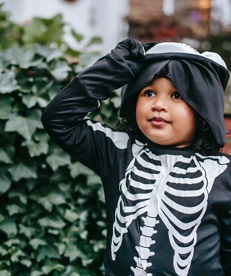 Boy in skeleton costume, photo by Charles Parker, pexels 5859585
