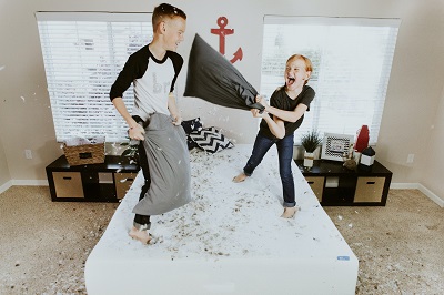 Kids' pillow fight Photo by Allen Taylor