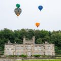 Balloons in the sky over Bolesworth Castle | Cheshire Balloon Fiesta by milnerCreative