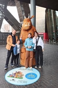 Family visiting exhibition at The Lowry