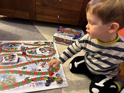 child playing a board game